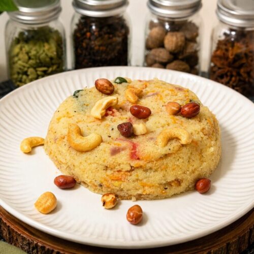 Easy Fluffy Sooji Upma served with roasted cashews and peanuts in a white bowl – 15-minute South Indian breakfast recipe.